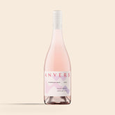 A bottle of 2025 Razorback Road Syrah Rosé wine with a pink label that matches the wine's color.